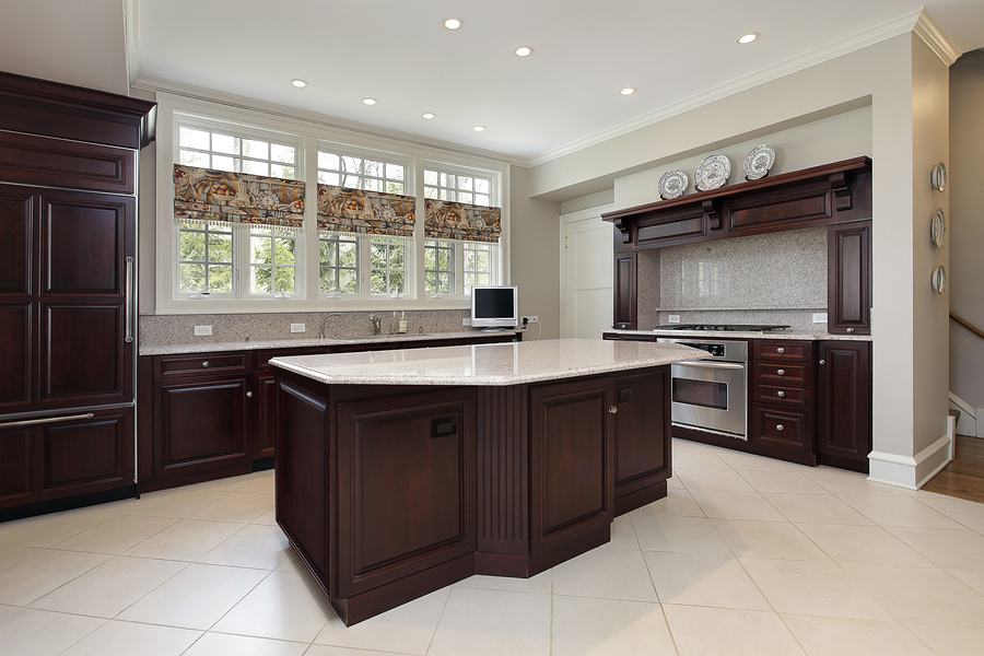 Kitchen in luxury home with cherry wood cabinetry